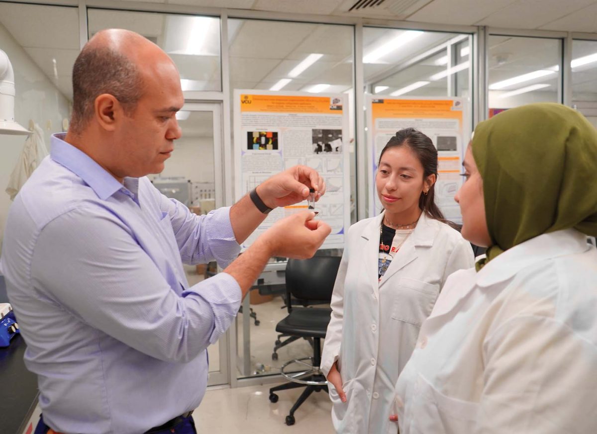 Dr. El-Gendy teaching and explaining the nature of his magnetic experiment to his students. 