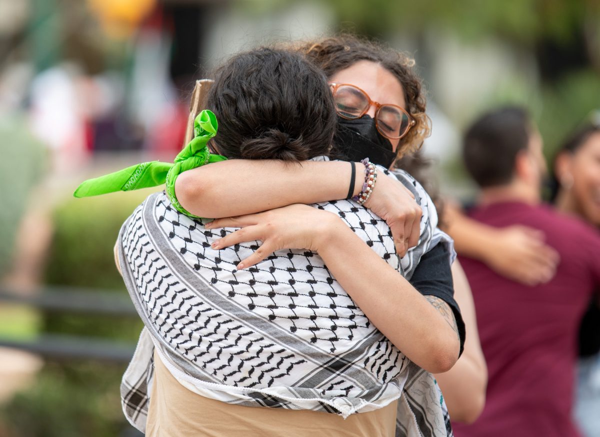 Attendees embrace at the All Out For Garza rally held on Oct. 21.  