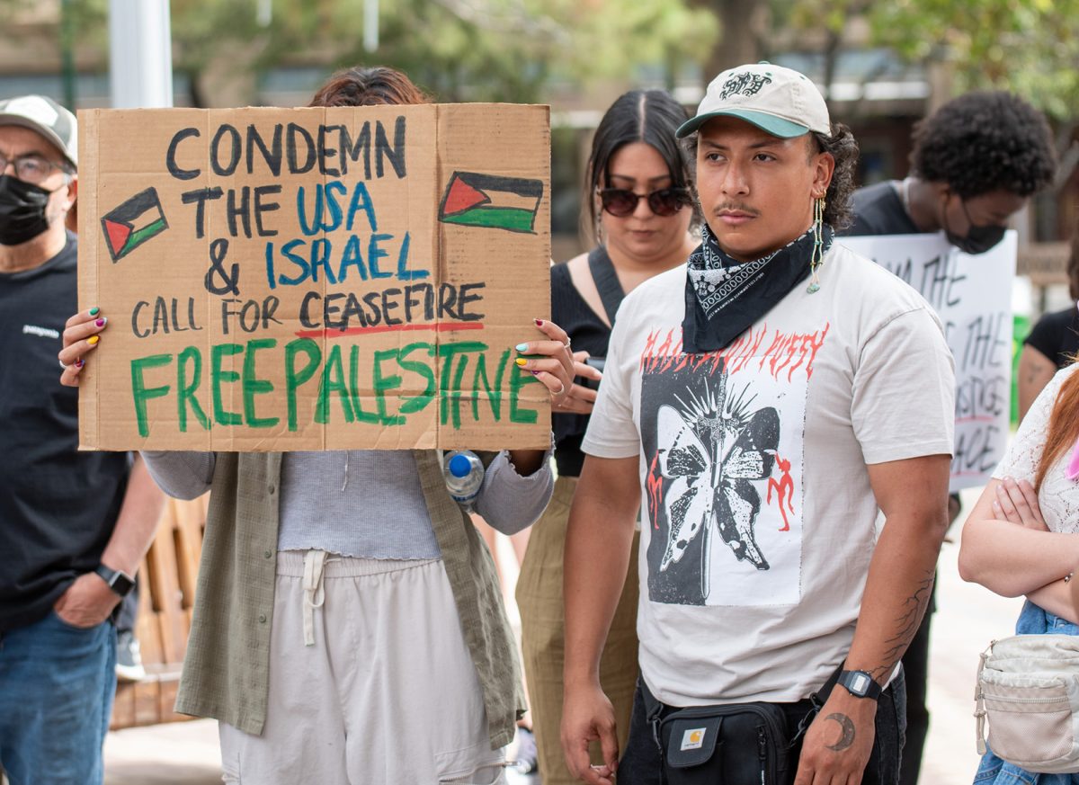 Attendee holds a sign up in support of Palestine at the All Out For Gaza rally on Oct. 21. 