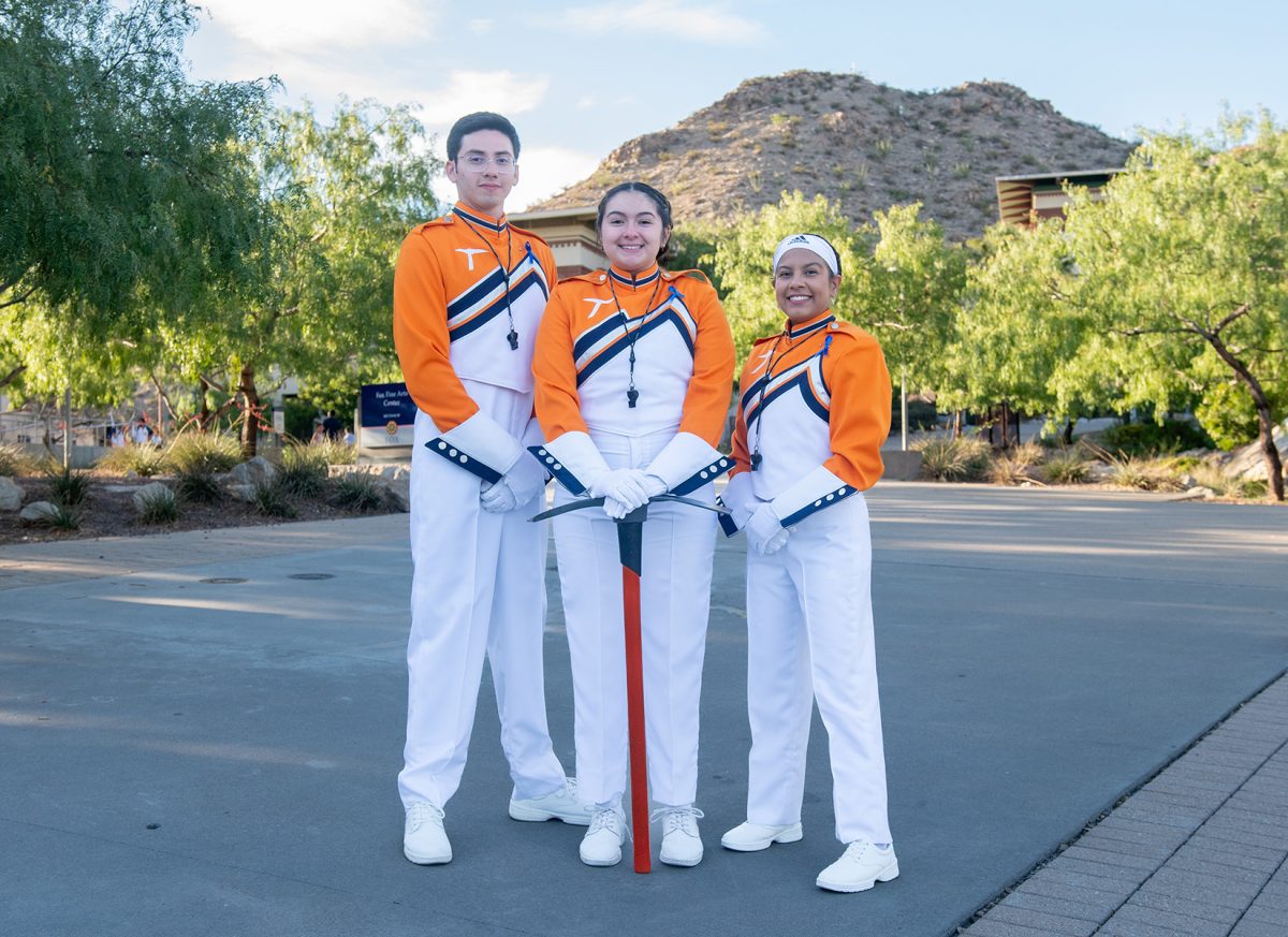 The UTEP Marching Miners are lead on the field by this year’s Drum Majors Ramsey Perez (left), Cassandra Gil (center) and Alexa Andrade Fuentes (right). 