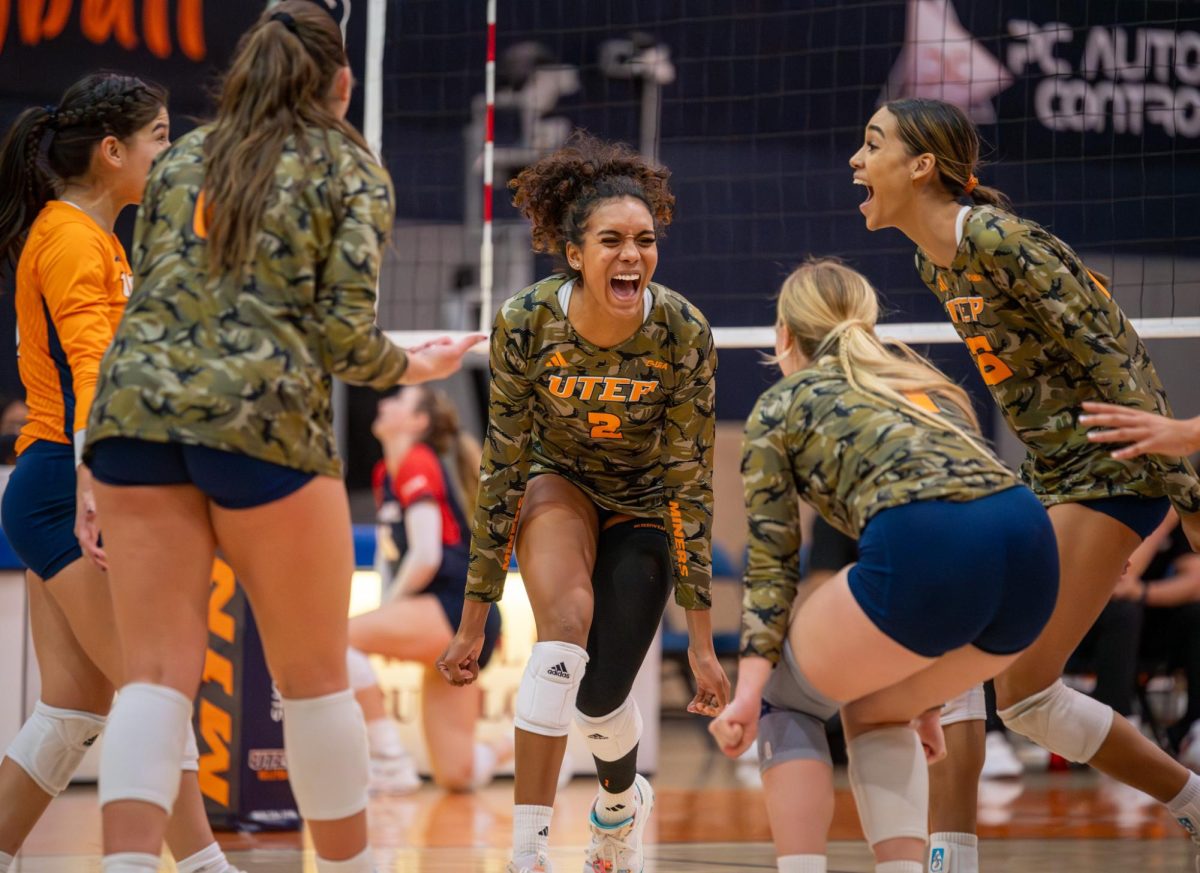 Outside hitter/middle blocker Alianza Darley celebrates a score with her teammates. 