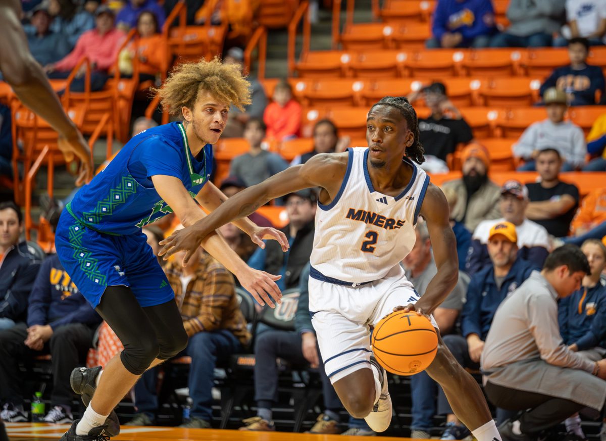 Guard Tae Hardy attempts to dribble around the defender during a game against Texas A&M-CC on Nov. 29.  