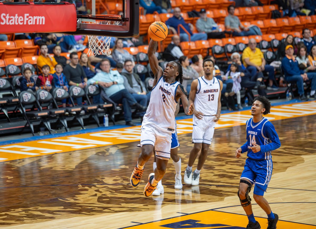 Guard Tae Hardy jumps into the air in attempt to dunk the ball during a game against Middle Tennessee on Jan. 18.  