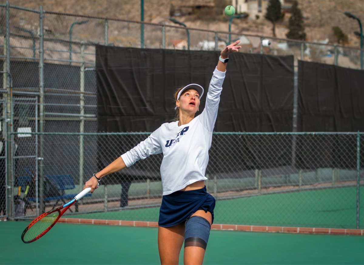 Senior Elena Dibattista serves the ball to her opponents on Jan. 20. 