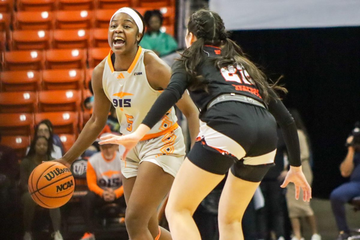 Junior guard Delma Zita calls out a play while being guarded by Sam Houston senior guard Shanti Henry, Jan. 27 at the Don Haskins Center. 