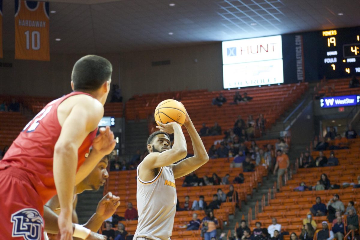 UTEP+player+attempts+to+shoot+with+time+racing+against+the+buzzer+