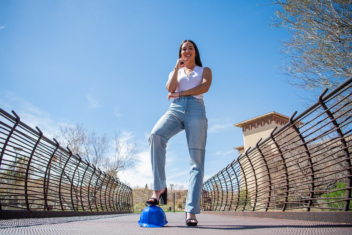 Marta Romeu Chen, balances her time between the classroom and the golf course.