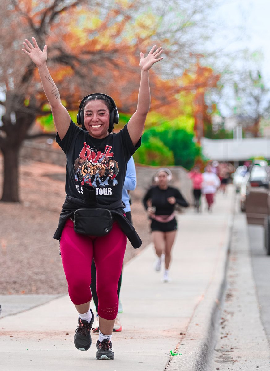 Girl excited to be more than halfway through 3-mile run.