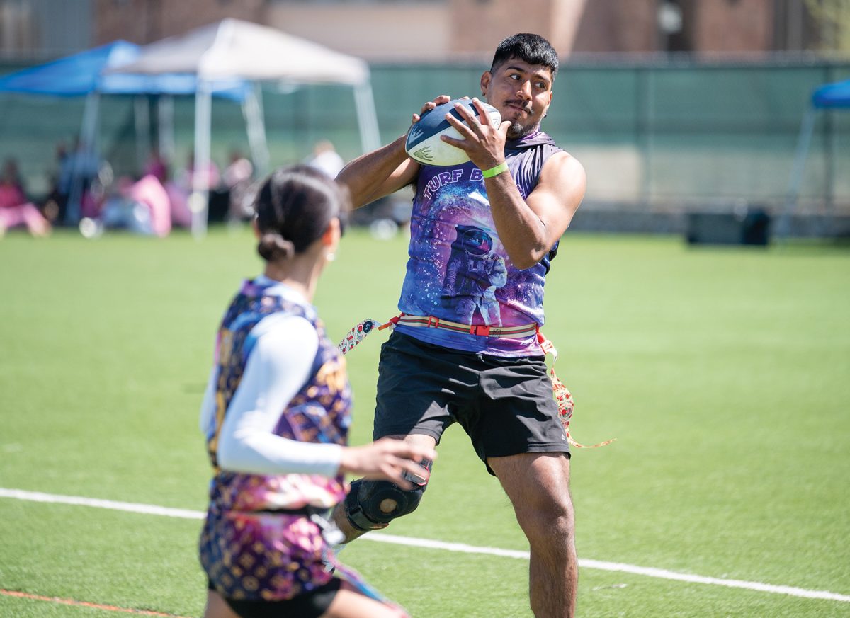 Player catches the ball for a touchdown during a game, April 27.