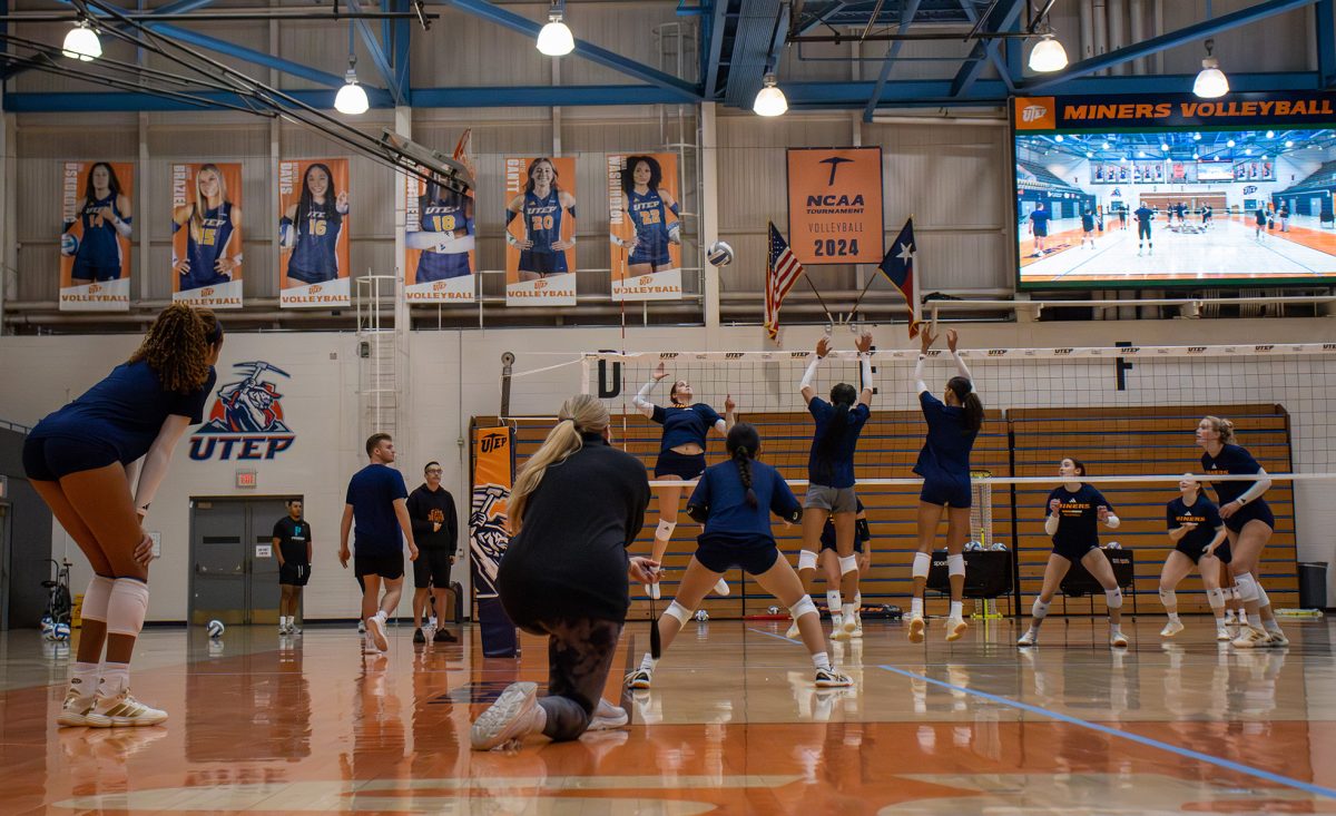 Overlooking a drill, assistant coach Courtney Johnson cheered the miners on from the sidelines of the court. The miners practiced their spiking and blocking against opposing teams. 