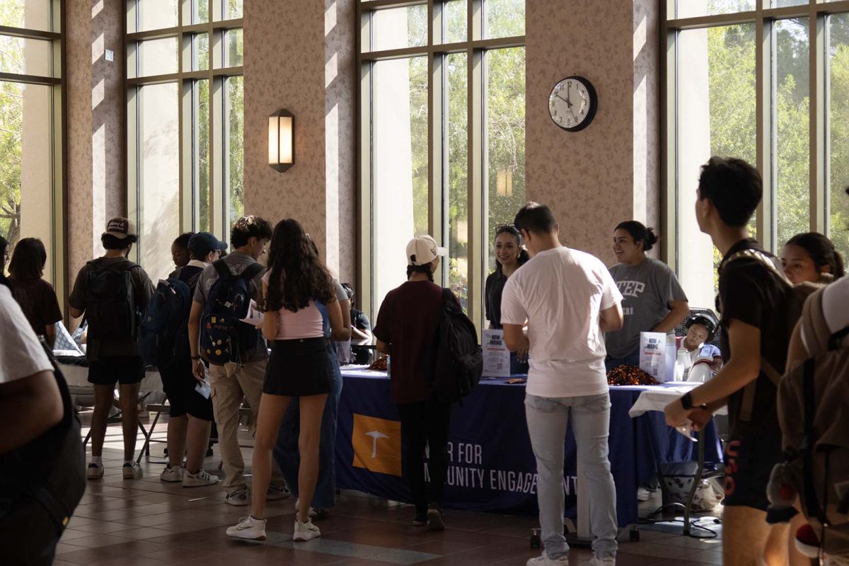 he Center for Community Engagement staff share resources with UTEP students during the Work at UTEP Fair.