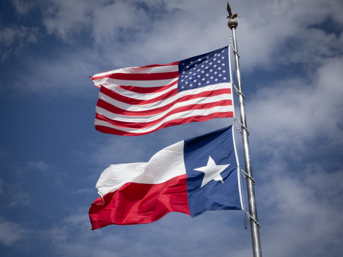 The U.S. and Texas State flags wave during the 2025 government shutdown, Wednesday, Oct. 8, 2025.
