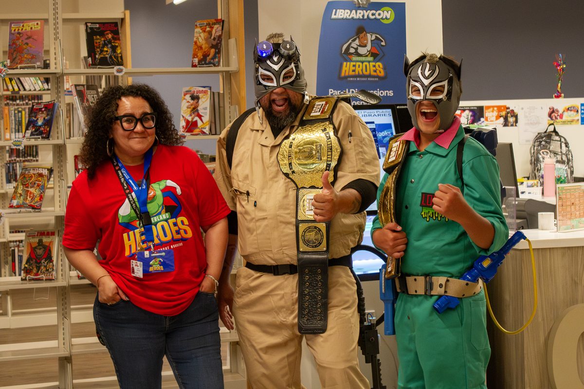 Participants of the costume contest dressed as lucha libre Ghostbusters for Library-Con.