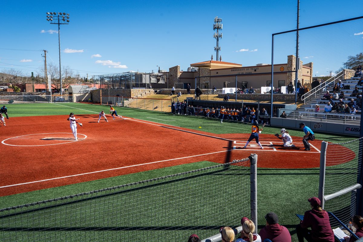 Bri Garcia hits a walk-off RBI single to score the winning run from third base as teammates and fans celebrate the Miners victory.