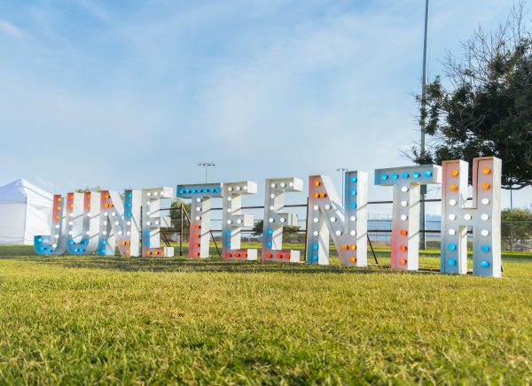 A Juneteenth sign is displayed during the fourth annual Juneteenth Celebration at Nations Tobin Park on June 13. Juneteenth marks June 19, 1865, the day were all remaining  enslaved people were freed more than two years after the Emancipation Proclamation.